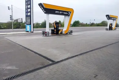 Лоток водовідвідний з ухилом 0,5% бетонний DN110 Vodaland Mega E600 H135-130 з решіткою чавунною щілинною